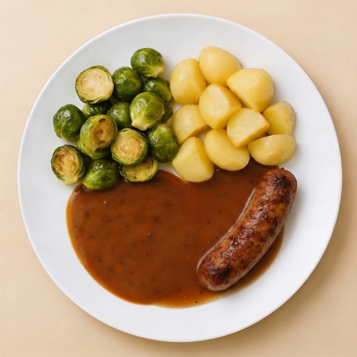 Spruitjesschotel met saucijsje
